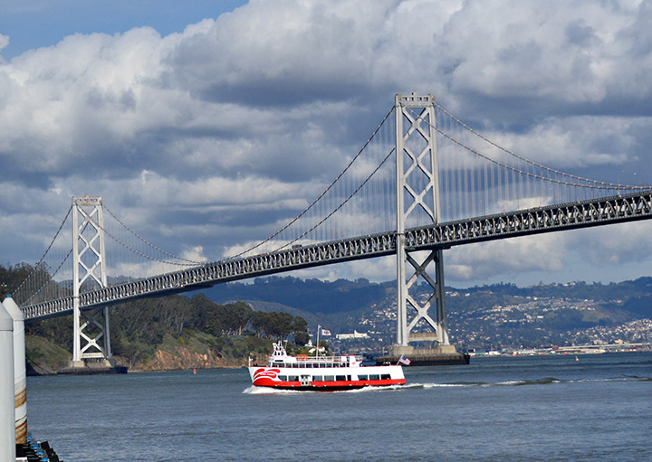 Ferry Boat by Bay Bridge on San Francisco Bay